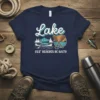 Lake Cuz' Beaches Be Salty t-shirt featuring a canoe, oars, mountains, and sunset graphic