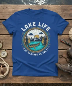 Lake Life Cuz Beaches Be Salty t-shirt with vintage circular graphic of a lake, mountains, trees, and a canoe
