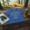 Blue t-shirt with "Lake Monroe Unsalted Shark Free Indiana" text and an anchor graphic