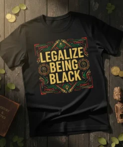 Black t-shirt with "LEGALIZE BEING BLACK" text in gold, featuring geometric patterns and raised fist graphics