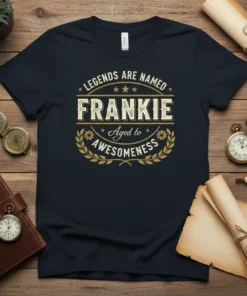 Legends Are Named Frankie Aged to Awesomeness text design on a navy t-shirt, featuring vintage style typography and laurel wreath