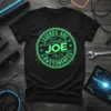 Black t-shirt with neon green text reading "Legends Are Named Joe Aged To Awesomeness" in a circular design