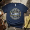Navy t-shirt with "Legends Are Named Saoirse Aged to Awesomeness" in a gold circular design. Features vintage typography and stars