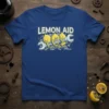 Lemon Aid T-Shirt featuring cartoon lemons holding a wrench with a distressed background and bold text