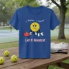 Blue t-shirt with "I know. I know" and "Let It Bounce!" text, featuring a sad pickleball character holding a paddle