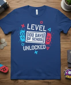 Level 100 Days of School Unlocked t-shirt design with video game controllers and pixelated graphics