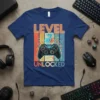 Level 7 Unlocked graphic t-shirt design for a 7th birthday, featuring a retro video game controller and neon text