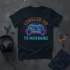 Leveled Up To Husband t-shirt with neon game controller and city skyline graphic