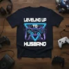 Leveling Up To Husband text with a video game controller graphic on a navy t-shirt