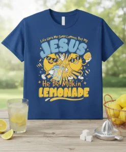 Blue t-shirt with "Life Gave Me Some Lemons, But My JESUS He Be Makin LEMONADE" text and cartoon lemons holding