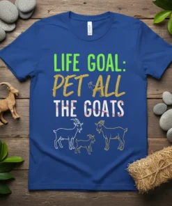 Life Goal: Pet All The Goats t-shirt design featuring green and gold text with illustrations of goats