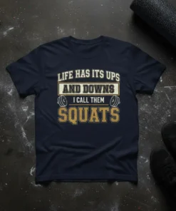 Navy t-shirt with "Life Has Its Ups And Downs I Call Them Squats" text and barbell graphics, designed for gym
