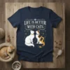 Life Is Better With Cats quote on a navy t-shirt with two cats sitting side-by-side, celestial accents, and hearts