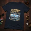 Life Is Short Hit Max Bet quote above a detailed slot machine graphic with three diamonds on a navy t-shirt