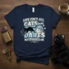 Black cat jumping in front of a dartboard with text "Life Isn't All Cats And Darts But It Should Be"