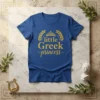 Blue t-shirt with gold glitter text "little Greek princess" and a crown graphic, designed for girls