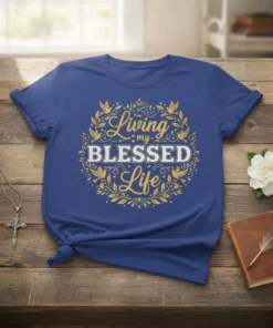 Living my Blessed Life quote on a blue t-shirt, surrounded by gold floral and bird design elements