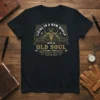 Living in a New World with an Old Soul t-shirt featuring a bull skull, guitars, and vintage ornate design