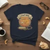 T-shirt design with "LOAFING..." text above a sleeping tabby cat within a circle and a loading bar graphic