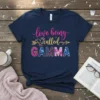 Love Being Called GAMMA t-shirt with glitter pink and gold text and colorful patterned letters for GAMMA