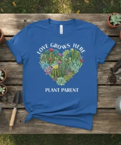 Blue t-shirt with "Love Grows Here Plant Parent" text and a heart shape filled with colorful succulents