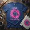 LOVE Made with Magic t-shirt with pink heart hands, roses, and crystals. Inspirational quote design in neon pink
