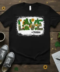 Black t-shirt with "LOVE #CNAlife" design, featuring a gnome, sunflowers, and shamrocks