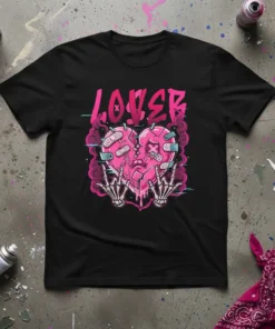 Black t-shirt featuring the word "Lover" in pink graffiti font above a cracked pink heart with band-aids and skeleton hands