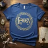 Blue t-shirt with "Lovey" text inside a golden floral circular design