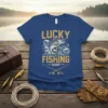 Lucky Fishing Shirt design with a leaping fish, waves, and crossed fishing rods. Features the words "LUCKY FISHING SHIRT" in