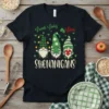 Lunch Lady Love SHENANIGANS t-shirt design with three gnomes and shamrocks, featuring green and white plaid and striped hats