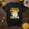 Black t-shirt with "Mac N Cheese Tester" text and cartoon bowl of mac and cheese graphic