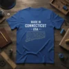 Blue t-shirt with white text "MADE IN CONNECTICUT USA" and a yellow geometric state outline of Connecticut