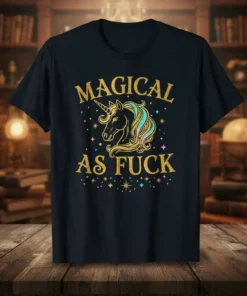 Black t-shirt with "Magical As Fuck" text and a glittery unicorn graphic, featuring gold lettering and colorful stars