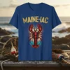 MAINE-IAC text above a detailed red lobster graphic on a blue t-shirt, representing Maine coastal pride