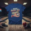 Make Bowling Great text with American flag, bowling ball, and pins graphic on a blue t-shirt