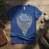 Make Heaven Crowded quote in ornate white and gold lettering on a royal blue t-shirt with intricate wing-like graphics
