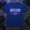 MAKE MY THUMB GREAT AGAIN text with a neon thumbs-up graphic on a royal blue t-shirt