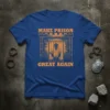 Make Prison Great Again text with prisoner graphic on blue t-shirt, political statement design