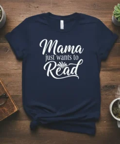 Mama just wants to Read text design with an open book graphic on a navy blue t-shirt