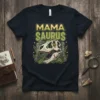 Mama Saurus t-shirt design featuring a T-Rex skull graphic and jungle foliage, with text "MAMA SAURUS" in a distressed font