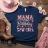 Mama of the Birthday Cow Girl text with cow print and glitter accents on a navy t-shirt, styled with a