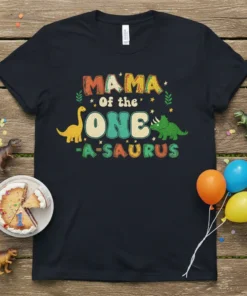 Mama of the One-A-Saurus text with cute dinosaurs graphic on a black t-shirt for a first birthday celebration