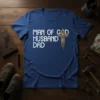 Man of God Husband Dad Christian T-Shirt with a detailed golden cross graphic and white text