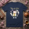 Navy blue t-shirt with a Maneki Neko cat design in a circle, featuring Japanese text and cherry blossoms