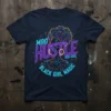 MAO Hustle Her Soul Black Girl Magic t-shirt with neon outline of a woman wearing a headwrap and large hoop