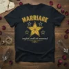 Black t-shirt with yellow text "MARRIAGE very bad, would not recommend" and a gold star graphic