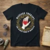 Massage Therapy The Oldest Form of Medicine quote with a hand holding a heart graphic on a black t-shirt