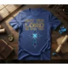 May The Lord Be With You Christian T-Shirt with a sparkling cross graphic and gold lettering