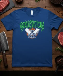MEAT SWEATS text design with crossed cleavers over a grill graphic, on a blue t-shirt